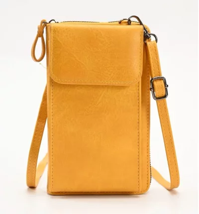 Stay stylish and organized with this large-capacity leather crossbody bag. Perfect for carrying essentials with secure zipper closure. A must-have for busy women.