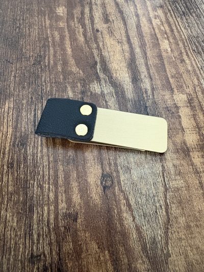 Looking for the perfect gift for him? This Stainless Steel Slim Money Clip with Leather offers a blend of modern style and practical function