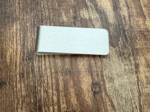 Looking for the perfect gift for him? This Stainless Steel Slim Money Clip with Leather offers a blend of modern style and practical function